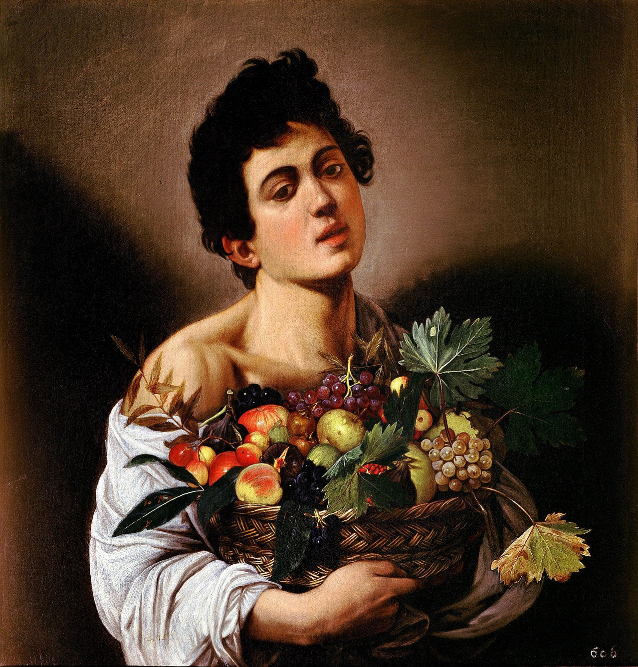 Ragazzo con un cesto di frutta (maglietta bianca)